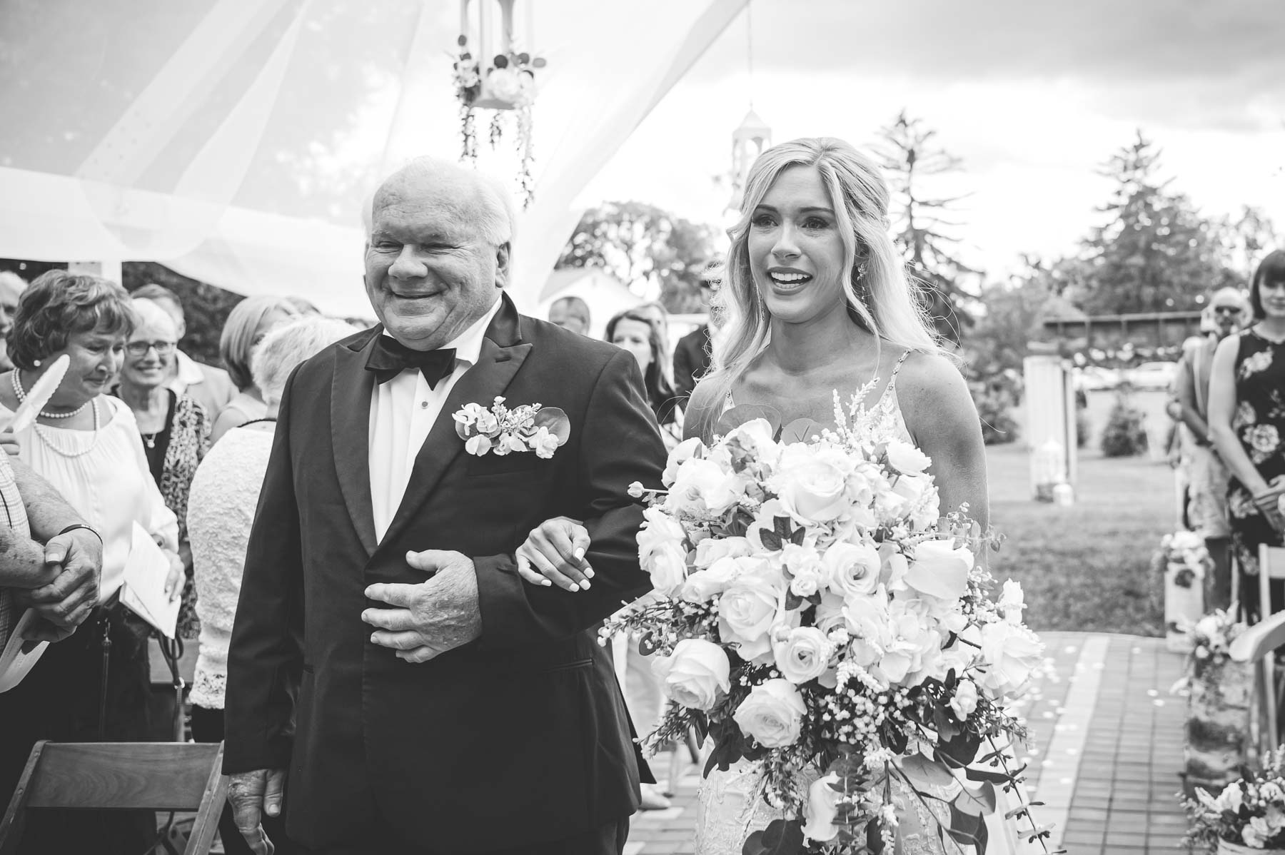 Dad walking daughter down the aisle at her wedding