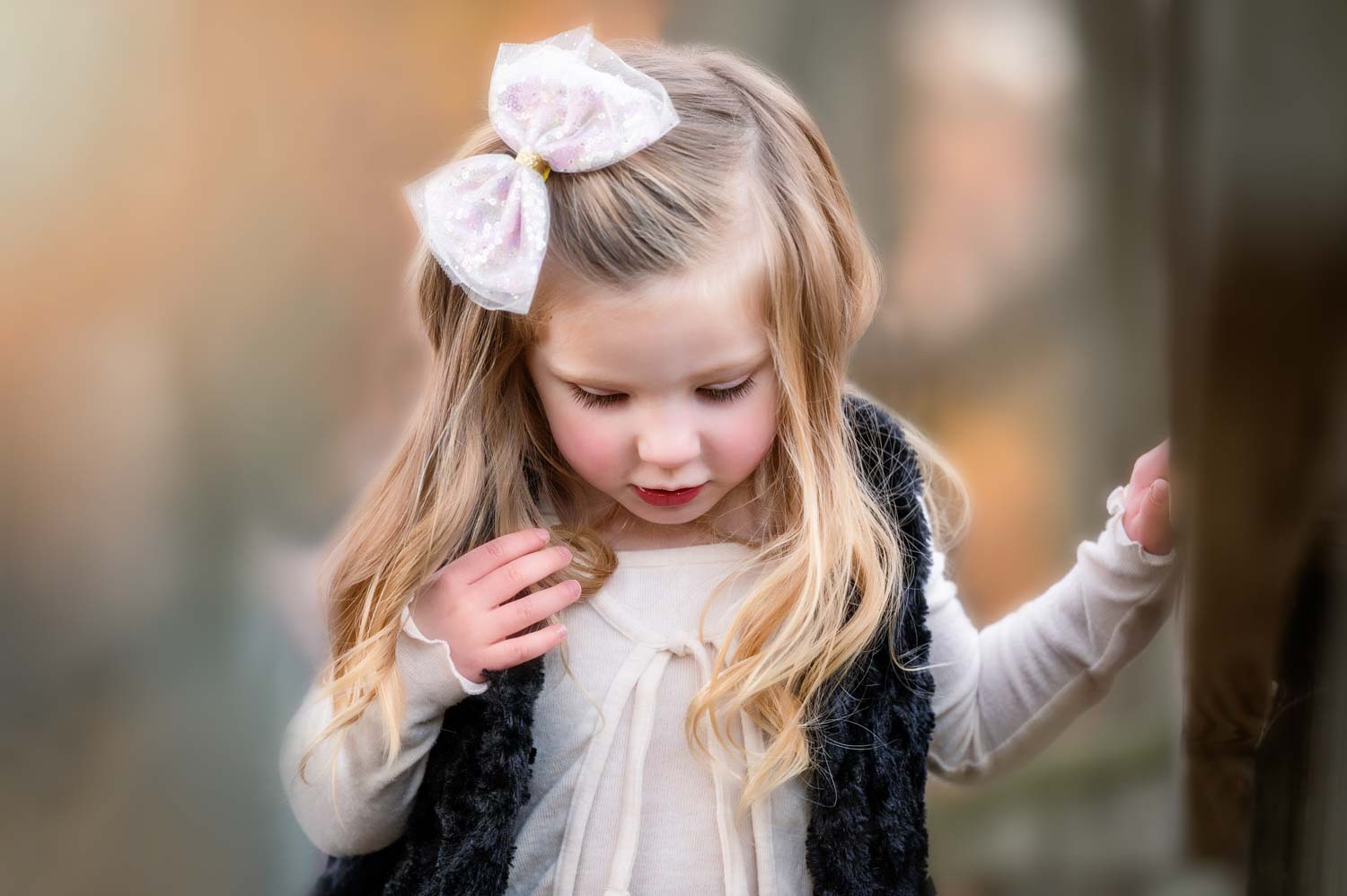 Little girl with bow in her hair fall photography