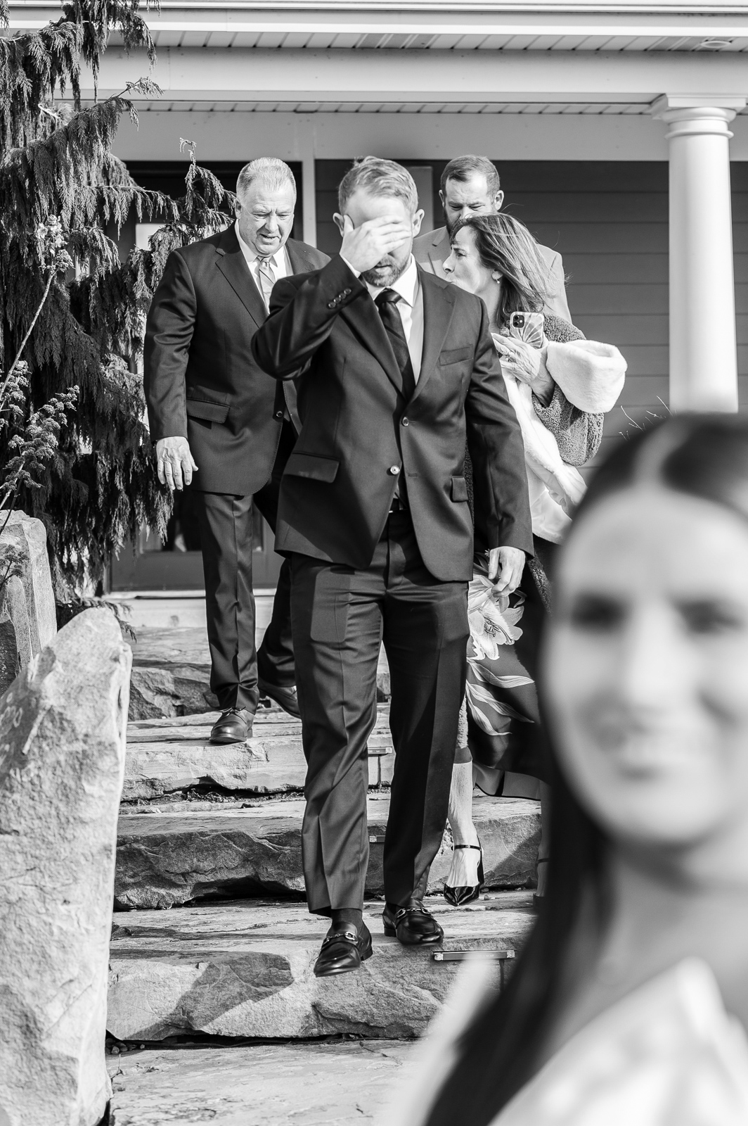 Groom getting ready for first look with bride